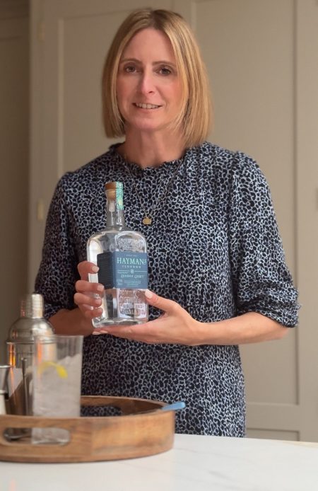 Cara Mills holding Haman's London Light Gin